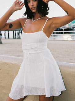 side view of model wearing Princess Polly Wispie Lace Up Mini Dress White Square Neck 