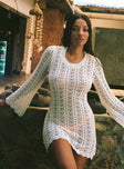 White Long sleeve mini dress Crochet style, high neckline, open back with tie fastening, flared sleeves