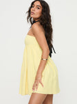 side view of model wearing Princess Polly Osment Strapless Mini Dress Lemon Straight Neck 