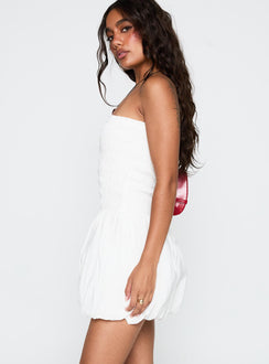 side view of model wearing Princess Polly Anemone Bubble Hem Mini Dress White Straight Neck 