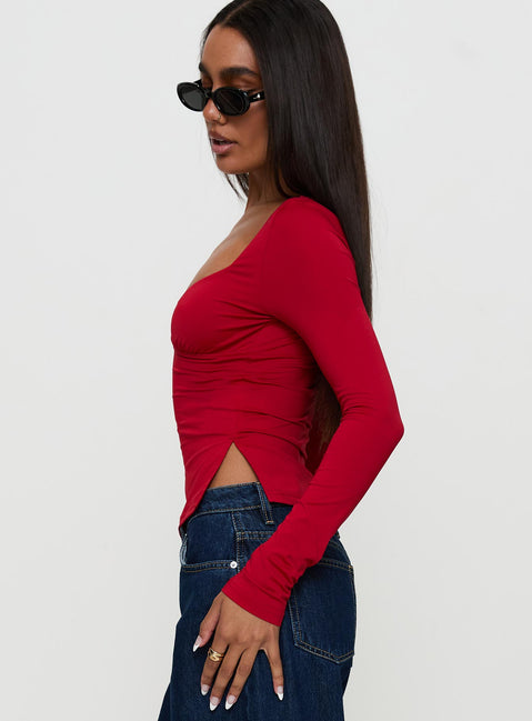 side view of model wearing Princess Polly Keane Long Sleeve Top Red Full Sleeves Sweetheart 