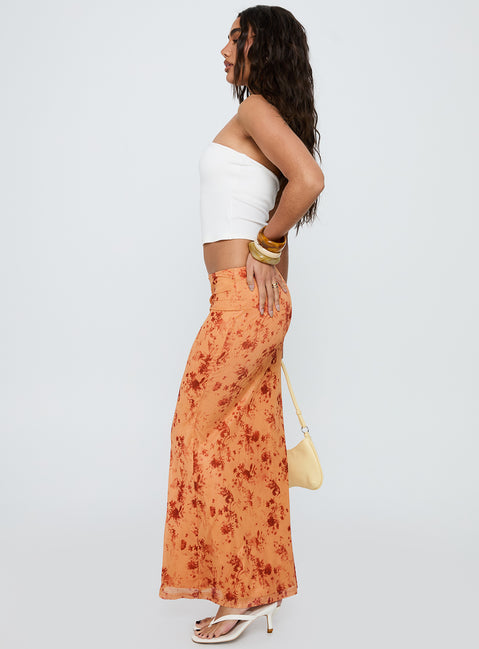   side view of model wearing Princess Polly Shepherd Maxi Skirt Orange Multi Maxi 