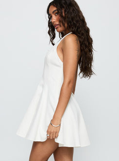 side view of model wearing Princess Polly Out Of Nowhere Halter Mini Dress White Plunger 