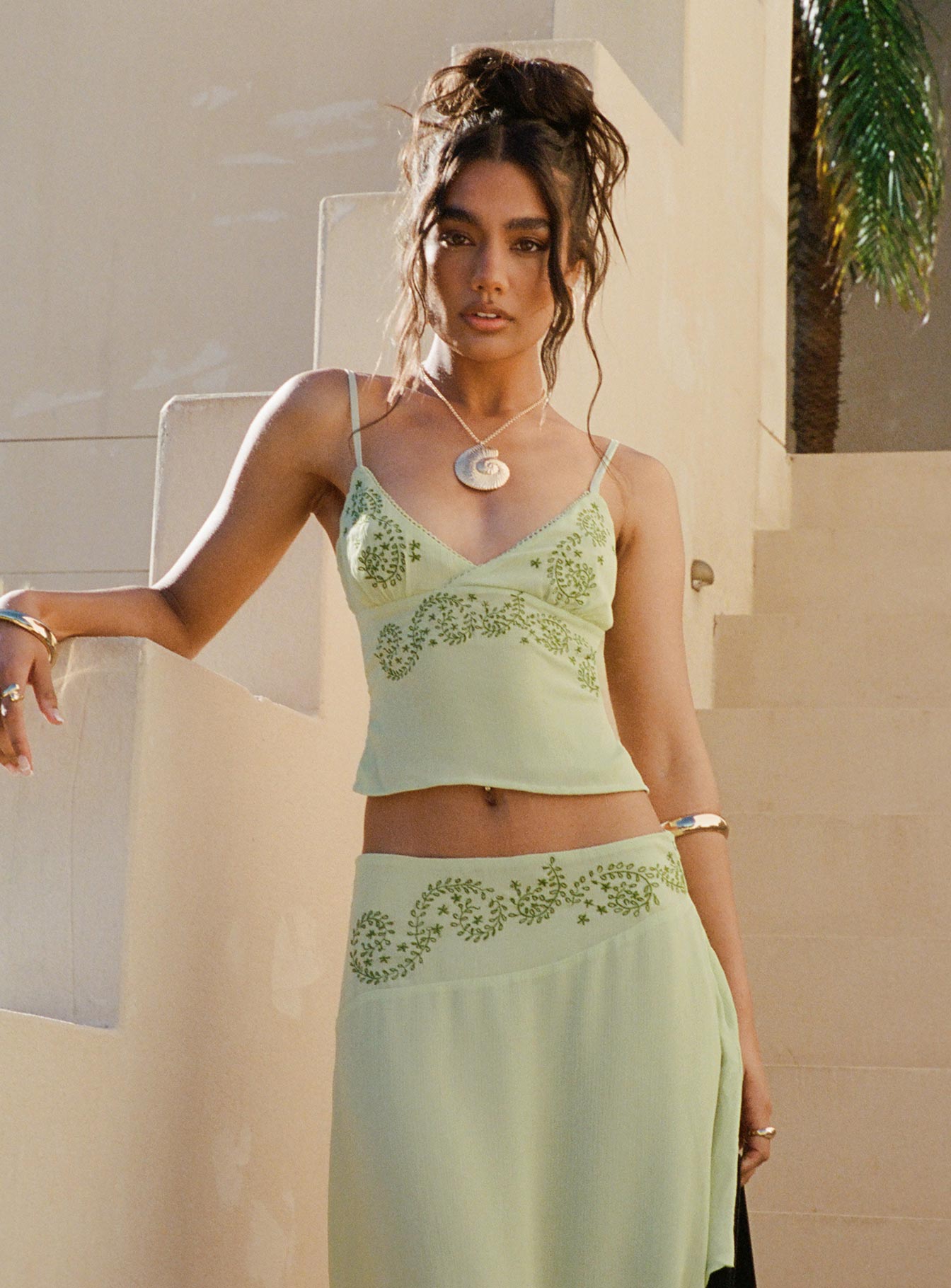 front view of model wearing Princess Polly Pappilion Top Sage Sleeveless Plunger 