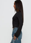 side view of model wearing Princess Polly Lifes Good Long Sleeve Backless Top Black Full Sleeves Crew Neck 