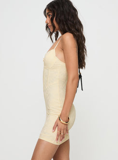 side view of model wearing Princess Polly Tarini Corset Mini Dress Cream Sweetheart Neckline 