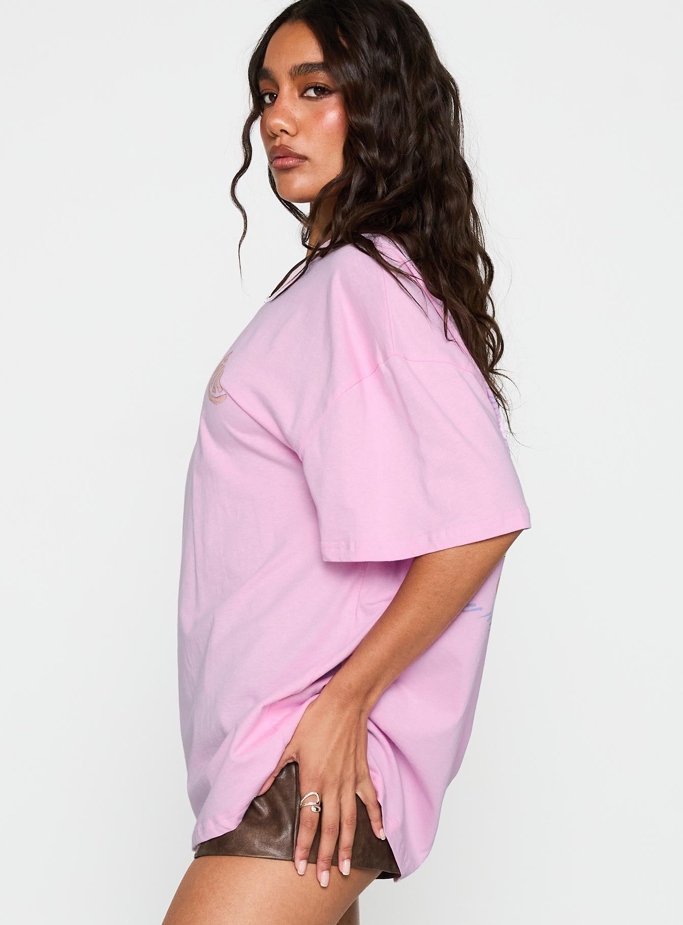 side view of model wearing Princess Polly Sardines Please Oversized Tee Pink Half Sleeves Crew Neck 