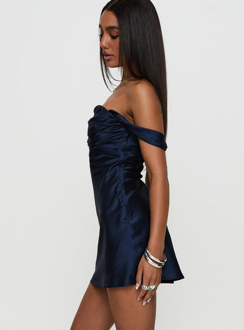 side view of model wearing Princess Polly Zabbarra Off The Shoulder Mini Dress Navy Square Neck 