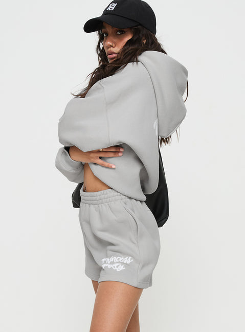 side view of model wearing Princess Polly Princess Polly Track Shorts Puff Text Grey 