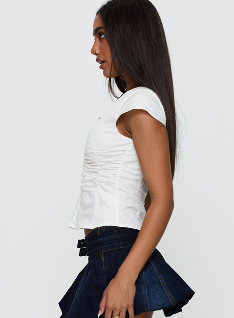 side view of model wearing Princess Polly Indulgence Corset Top White Short Sleeves V-Neck 