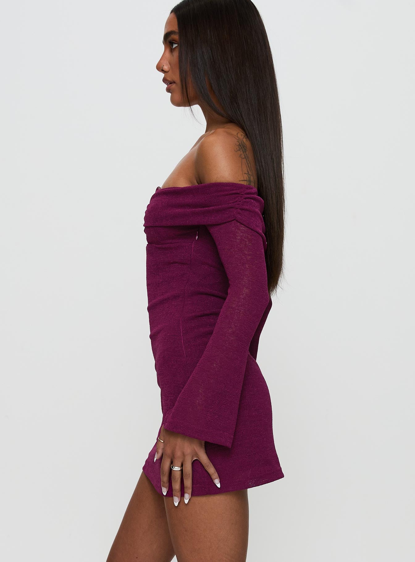 side view of model wearing Princess Polly Firenza Long Sleeve Mini Dress Purple Sweetheart Neckline 