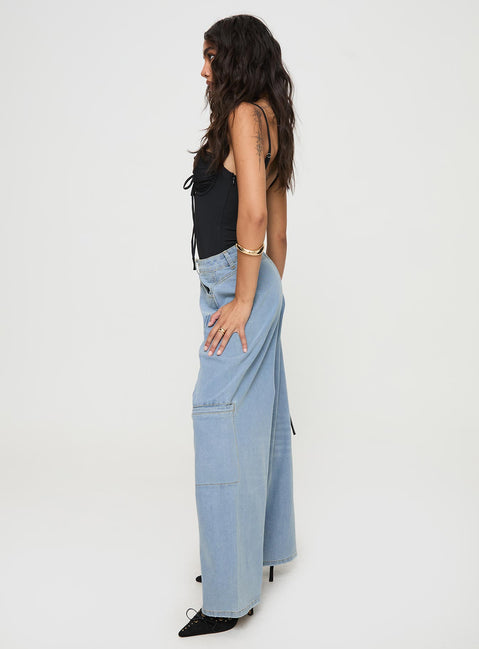 side view of model wearing Princess Polly Calendar Low Rise Jeans Vintage Wash Mid Rise 