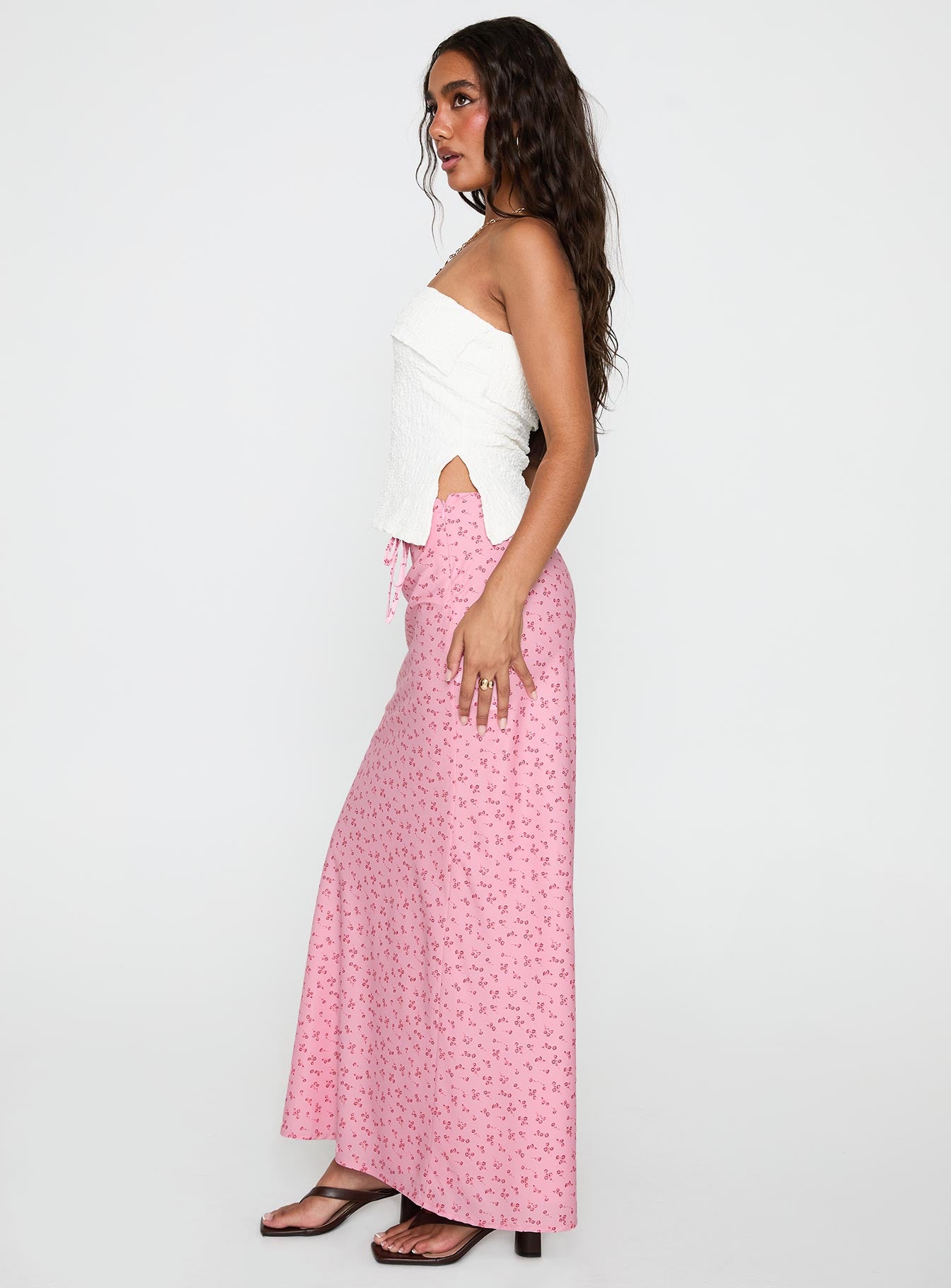   side view of model wearing Princess Polly Gorgina Tie Maxi Skirt Pink Multi Maxi 