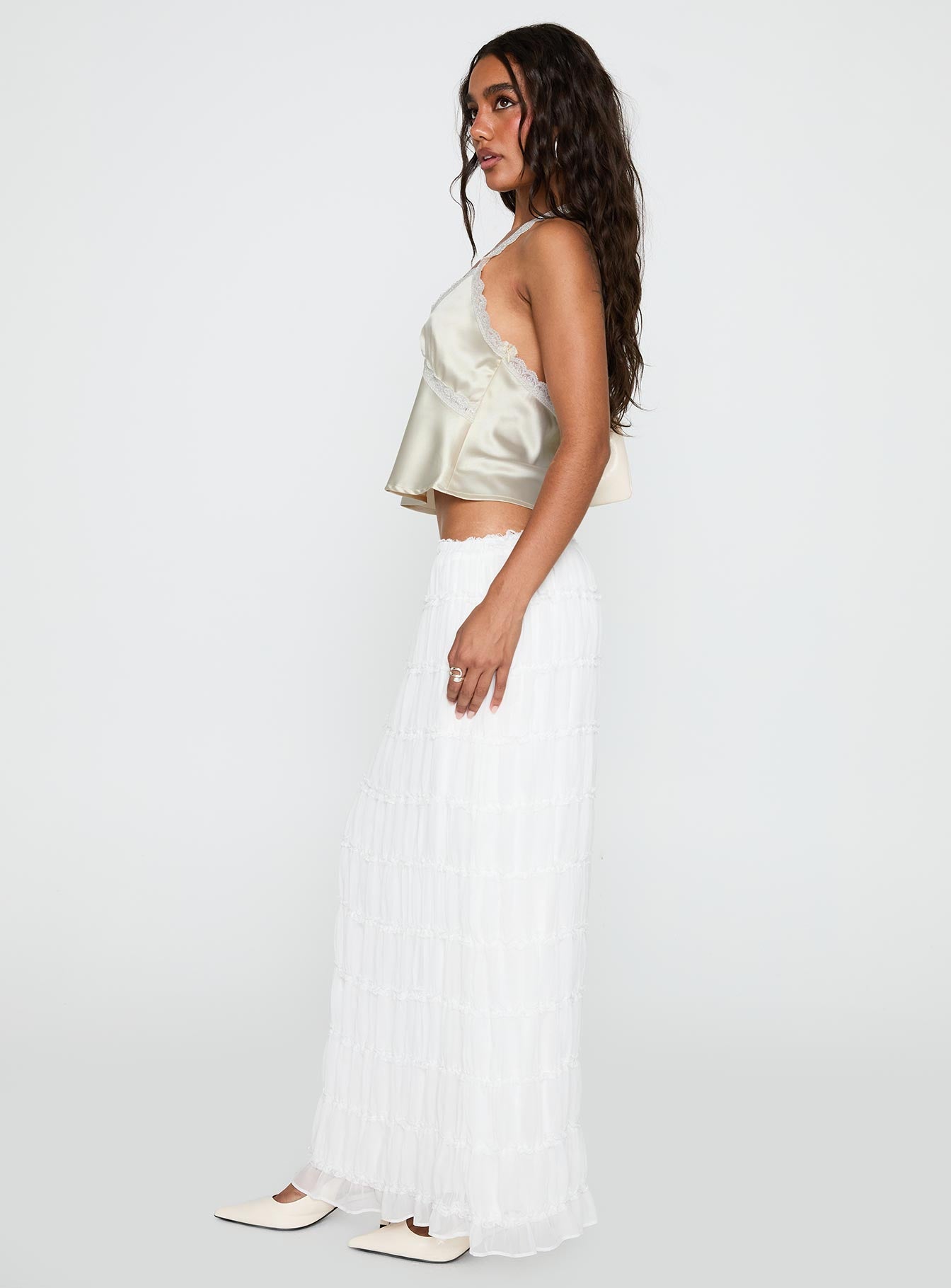   side view of model wearing Princess Polly Estefania Maxi Skirt White Maxi 