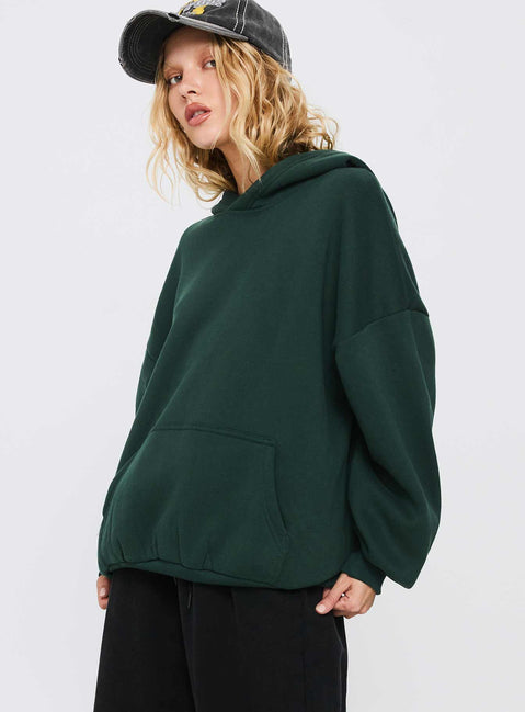 side view of model wearing Princess Polly Good Luck Graphic Hoodie Green / Blue Long 