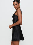 side view of model wearing Princess Polly Tremont Mini Dress Black Sweetheart Neckline 