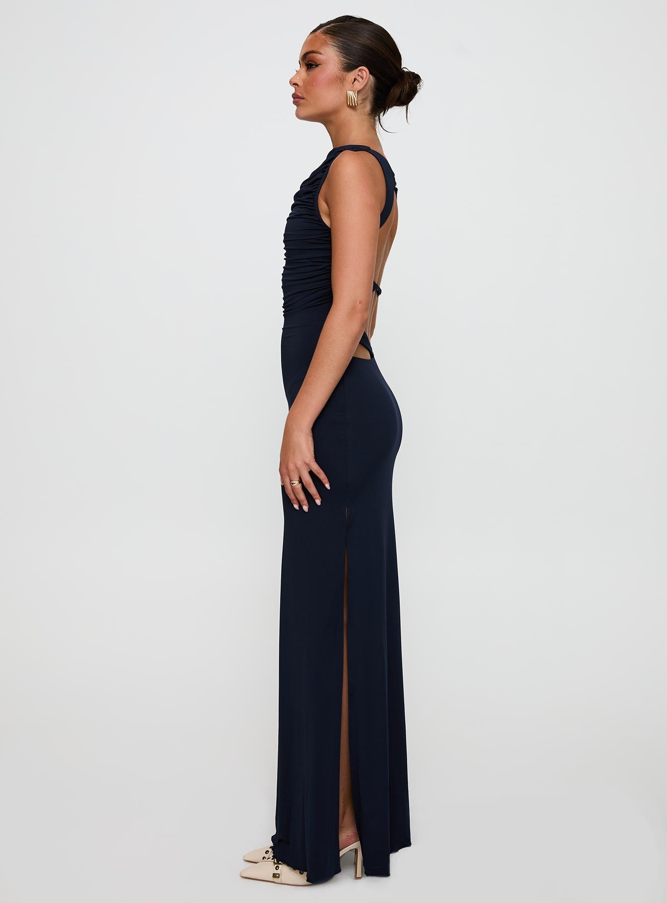 side view of model wearing Princess Polly Undeniable Cut Out Maxi Dress Navy High Neck 