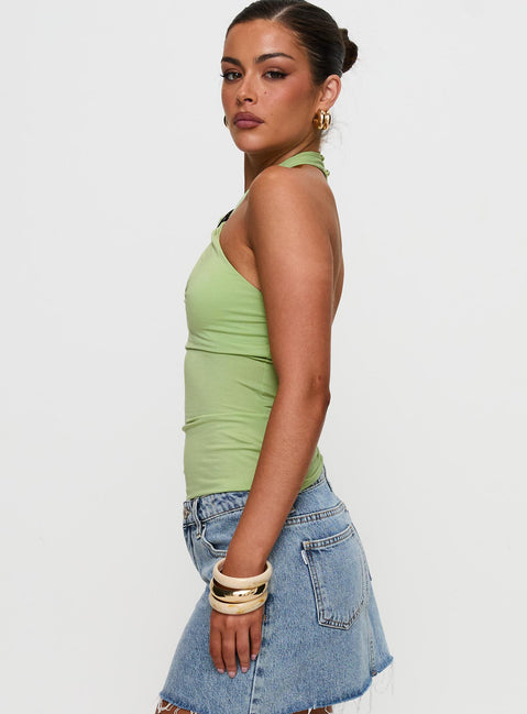 side view of model wearing Princess Polly Quell Top Green Sleeveless High Neck 
