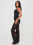 side view of model wearing Princess Polly Peru Lace Pants Black Low Rise Pants 