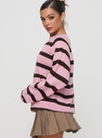 side view of model wearing Princess Polly Jacquette Knit Sweater Pink / Brown Long 