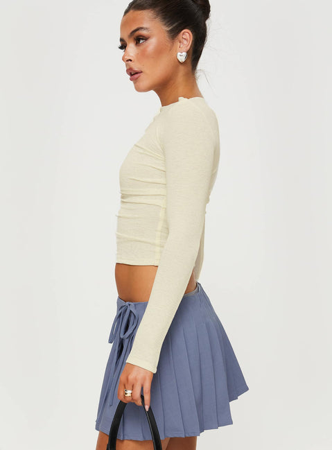 side view of model wearing Princess Polly Luvinia Long Sleeve Top Cream Full Sleeves Crew Neck 