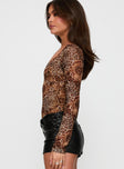 side view of model wearing Princess Polly Elixia Long Sleeve Bodysuit Leopard Full Sleeves 