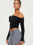 side view of model wearing Princess Polly Simonetta Off The Shoulder Top Black Full Sleeves straight 