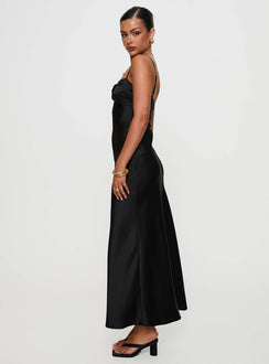 side view of model wearing Princess Polly Blackthorn Maxi Dress Black Sweetheart Neckline 