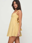 side view of model wearing Princess Polly Mcbeath Mini Dress Yellow Sweetheart Neckline 