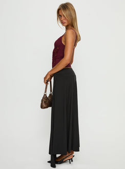   side view of model wearing Princess Polly Nola Hardware Slit Maxi Skirt Black 