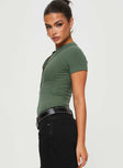 side view of model wearing Princess Polly Kandis Bodysuit Green Short Sleeves Crew Neck 