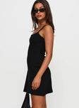 side view of model wearing Princess Polly Baseline Rib Mini Dress Black Square Neck 