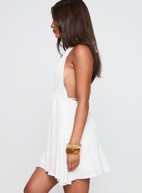 side view of model wearing Princess Polly Saddler Mini Dress White Plunger 