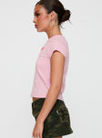 side view of model wearing Princess Polly I'm A Star Graphic Top Pink Short Sleeves Crew Neck 