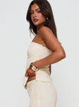 side view of model wearing Princess Polly Irresistible Strapless Top Cream Sleeveless straight 