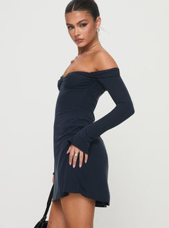 side view of model wearing Princess Polly Suizie Off The Shoulder Mini Dress Navy Sweetheart Neckline 