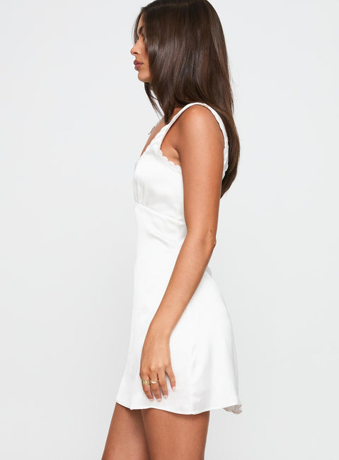 side view of model wearing Princess Polly Dasha Satin Mini Dress White Square Neck 
