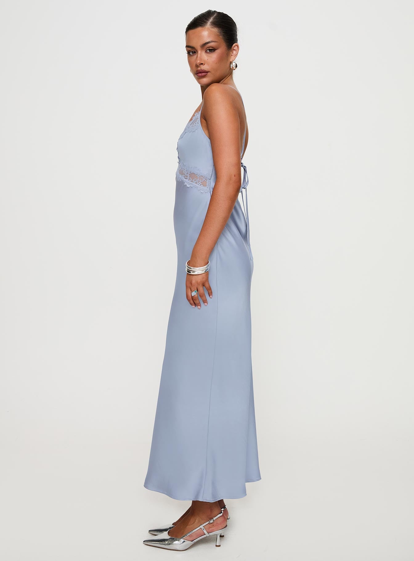 side view of model wearing Princess Polly Treasure Bias Cut Maxi Dress Blue V-Neck 
