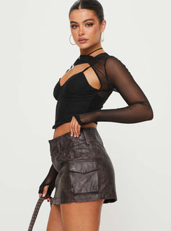  side view of model wearing Princess Polly Domenic Faux Leather Mini Skirt Washed Black Petite Mini Skirts 