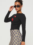 side view of model wearing Princess Polly Cherries & Cream Long Sleeve Top Black Full Sleeves Crew Neck 