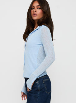 side view of model wearing Princess Polly Finnean Long Sleeve Top Pale Blue Full Sleeves V-Neck 