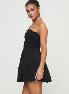 side view of model wearing Princess Polly Joie Strapless Mini Dress Black Straight Neck 