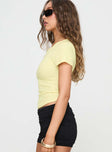 side view of model wearing Princess Polly Baseline Rib Tee Yellow Short Sleeves Crew Neck 