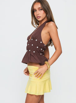   side view of model wearing Princess Polly Celebrations Mini Skirt Lemon Mini Skirts 