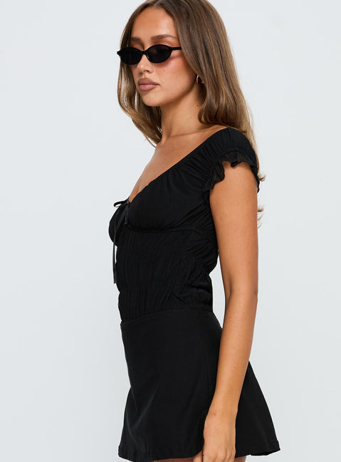 side view of model wearing Princess Polly Ahead Of Myself Off Shoulder Bodysuit Black Short Sleeves 