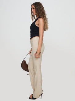 side view of model wearing Princess Polly Kinkirk Flared Pants Taupe Low Rise Pants 