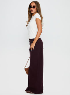 side view of model wearing Princess Polly Big News Mid Rise Wide Leg Jeans Currant Mid Rise Jeans 