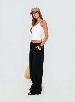 side view of model wearing Princess Polly Lunea Concealed Waistband Pants Black Low Rise Pants 