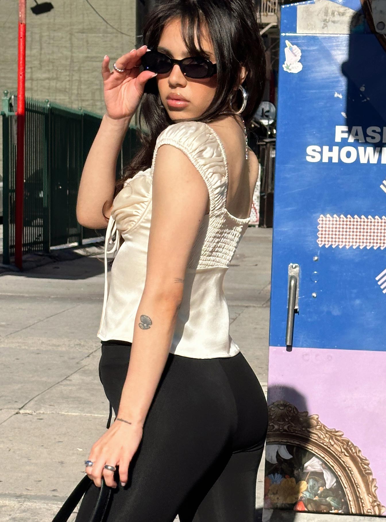 side view of model wearing Princess Polly Monument Top Champagne Sleeveless Sweetheart 