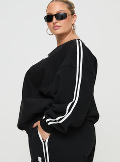 side view of model wearing Princess Polly Princess Polly Crew Neck Sweatshirt Stripe Black / White Curve 